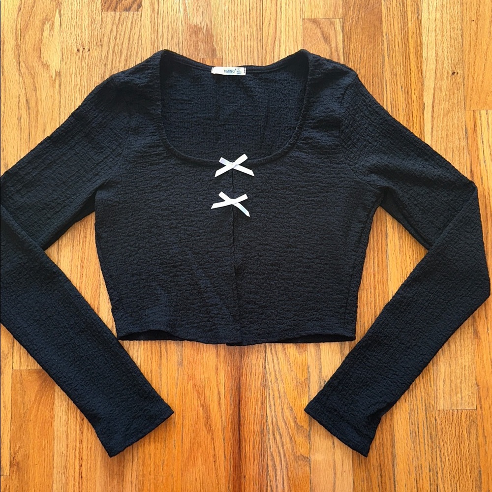 Timing Black Cropped Long-Sleeve Top with White Bow Accents - Picture 2 of 6